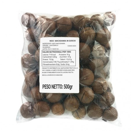 Paquet de 500gr noix de Macadamia en coque avec ouvre-noix