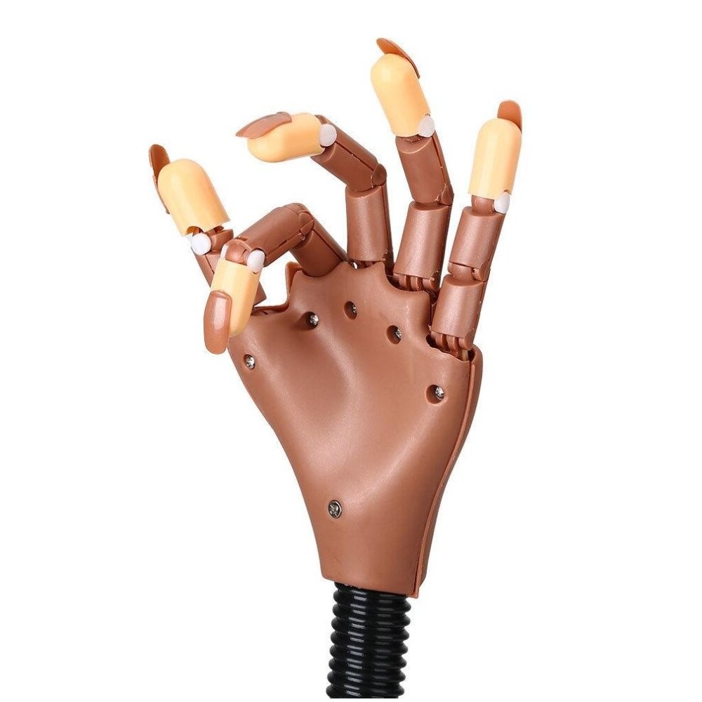 Fausse main articulée pour les ongles 184706...