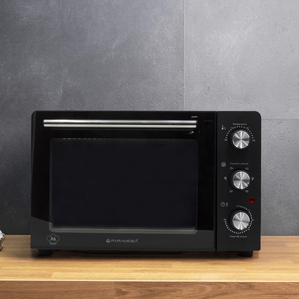 Four électrique ventilé 36L puissance 1500W...