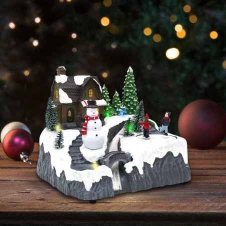 Scène de Noël enneigée carrousel musique lumières mouvement ruisseau