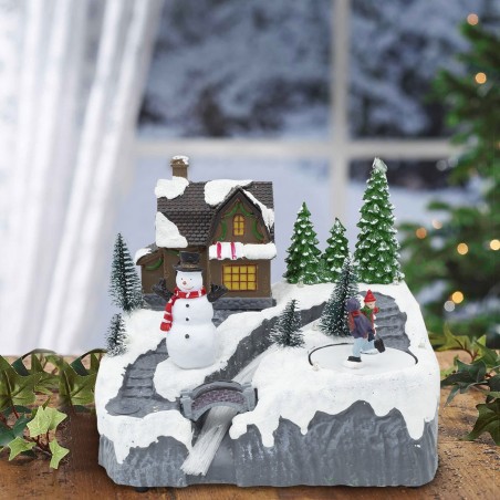 Scène de Noël enneigée carrousel musique lumières mouvement ruisseau