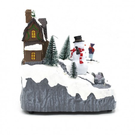 Scène de Noël enneigée carrousel musique lumières mouvement ruisseau