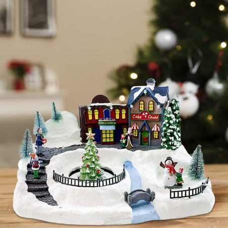Village de Noel enneigé Carrousel Lumières Sons Mouvement 37x21x27cm