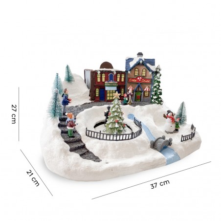 Village de Noel enneigé Carrousel Lumières Sons Mouvement 37x21x27cm