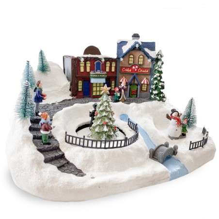 Village de Noel enneigé Carrousel Lumières Sons Mouvement 37x21x27cm