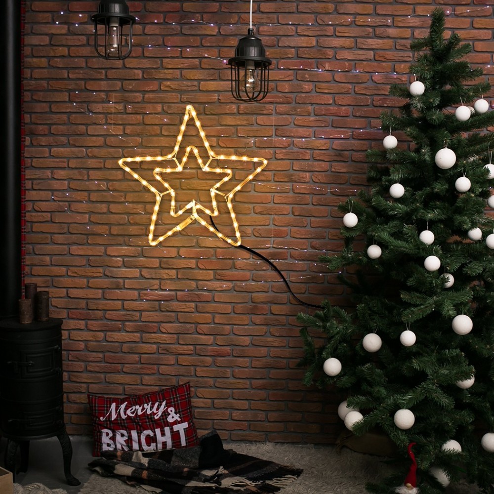 Étoile de Noël doublement lumineuse pour...