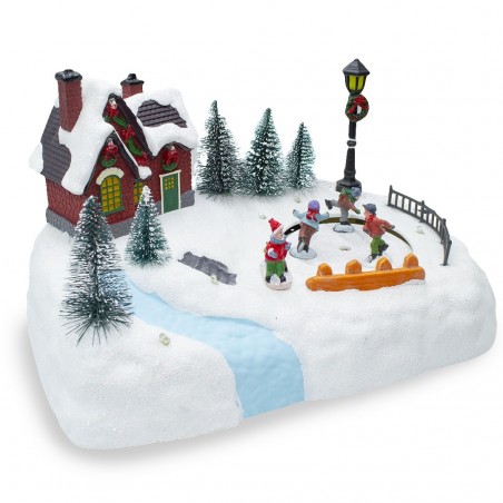 361040 Carrousel de Noël patinoire avec lumières, sons et mouvements 20x20x16 cm