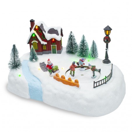 361040 Carrousel de Noël patinoire avec lumières, sons et mouvements 20x20x16 cm