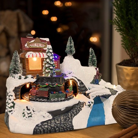 243012 Carrousel de Noël - Train avec lumières, sons et mouvements 24x16x17 cm